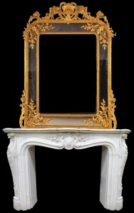 Ornate 19th century gold mirror perched above a magnificent statuary marble mantel, also 19th century. Historical Estates Auctions image